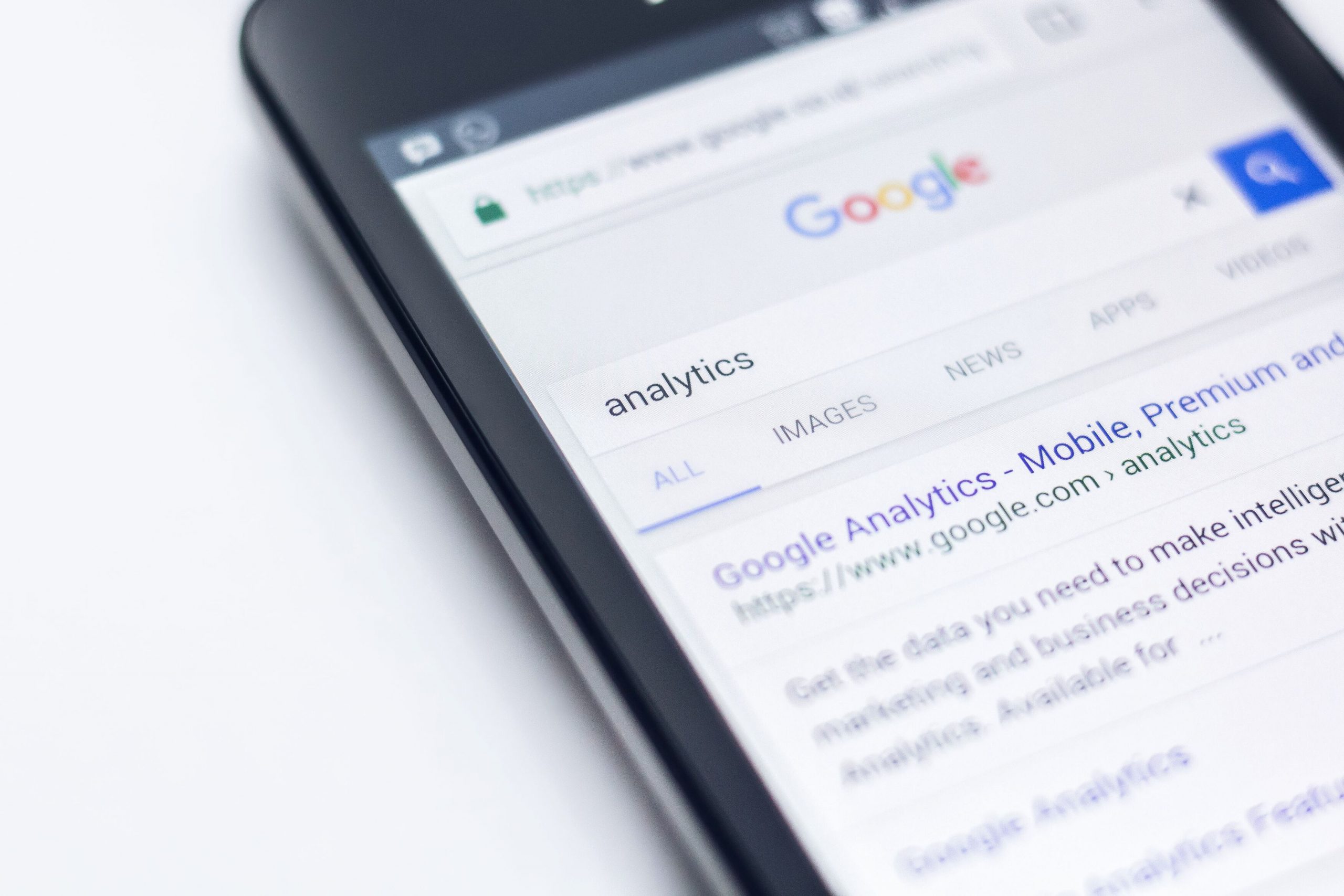 Close-up of Google Analytics on a smartphone Web Support For Businesses